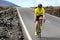 Road bike cyclist man cycling. Biking Sport fitness athlete biking on road bike. Active healthy sports lifestyle athlete cycling