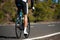 Road bike cyclist man cycling. Biking sports fitness athlete riding bike on an open road