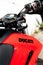 Road bike Ducati name detail on red vehicle body