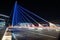 Road bridge at night with light trails