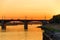 Road bridge to the river Volga city Tver at sunset
