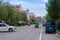 road with cars, streets of the Chinese city of Heihe in the summer