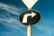 Road circle sign with arrow to the right and blue sky on background. Street object for transport and traffic safety drive