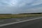 Road between cities Ukraine sky field