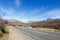 Road and Clouds pointing to The Swartberg Pass