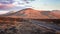 Road through corlorful volcanic landscape at sunset