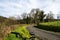 Road in countryside with turning and bike standing. Active rest, cycling