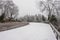 The road covered with snow in Zhangjiajie National Forest Park in winter season with foggy weather