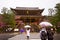 Road crossing at the Temple entrance People in and out of the temple grounds