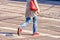 Road crossing with woman, pedestrian feet