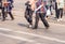 Road crossing with women, pedestrian feet