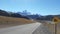 Road curve lake mountain cordillera blue sky asphalt