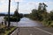 A road cut by floodwaters in north west Sydney, Australia