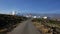 Road cutting through the arid volcanic lanscape of Tenerife island, road from Faro Punta de Abona towards village Poris de Abona