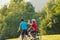 Road cyclists couple taking a ride break along a scenic route