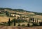 Road with cypress near Monticchiello in Tuscany