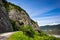 Road by the Danube river, forests and mountains