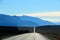 Road in the Death Valley National Park with colorful sky background, California