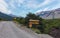 A road in El ChaltÃ©n city, and the signboard for the bikepath. Patagonia Argentina.