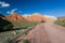 Road and eroded mountains in Kyrgyzstan