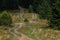 road in european mountain forest. Hiking trail in Carpathian Mountains, Ukraine. Tourist routes