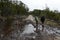 The road flooded because of the actions of beavers who built the dam.