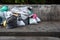 Road and footpath full of garbage / Dirty street.