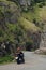 Road going through Cheddar Gorge, Somerset, UK, biker riding through, motion blur