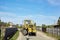 Road grader - heavy earth moving road construction equipment