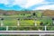 Road highway bridge, viaduct supports in the valley among the green hills, transport infrastructure