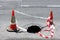 Road hole with warning cones