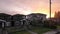 Road and Homes in Suburban Neighborhood, Sunset. Fall Season. Burnaby, British Columbia, Canada