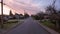 Road and Homes in Suburban Neighborhood, Sunset. Fall Season. Burnaby, British Columbia, Canada