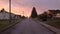 Road and Homes in Suburban Neighborhood, Sunset. Fall Season. Burnaby, British Columbia, Canada