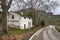 Road and house in the natural park of the Subbetic mountains in Cordoba. Spain