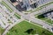 Road intersection in new residential district. aerial view in sunny summer day