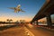 Road ,land bridge run into ship port and commercial cargo plane