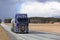 Road Landscape with Blue Scania Tank Truck