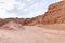 Road leading down to the deep blue Hidden Lake near the Timna park,surrounded by mountains near Eilat city, Arava Valley,