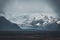 Road leading towards huge glacier and mountains in Iceland Vatnajokull glacier aerial drone image with street highway