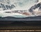 Road leading towards huge glacier and mountains in Iceland Vatnajokull glacier aerial drone image with street highway