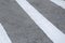 Road line marking made from white thermoplastic material.