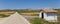 Road and little white house in the landscape of Castilla y Leon