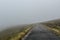 Road lost in the fog on the mountain, in Viseu