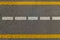 Road marking for lane driving , highways painted in white and yellow lines both direction traffic movement control by