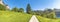 Road through a meadow in the Swiss Alps