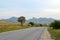 Road, mountain, grass, sky