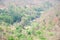 Road in the mountain, river and village in forest at Op Luang National Park, Hot, Chiang Mai, Thailand. Hot weather and arid.