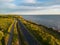 Road near a cliff in Paldiski at sunset in summer