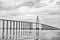 Road passage over water on cloudy sky. Bridge over sea in manaus, brazil. architecture and design concept. Travel